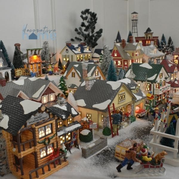 Department 56 Snow Village display that has many houses.