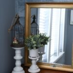 I have some great cleaning tools that I use to keep this mirror and candle holders on a shelf clean.